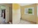 Modest bathroom featuring tiled floors, a window, and a shower stall at 102 N Whitcomb Ave, Indianapolis, IN 46224