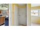 Bathroom featuring tiled floors, a shower stall, and a window at 102 N Whitcomb Ave, Indianapolis, IN 46224