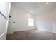 Carpeted bedroom with neutral paint, white ceiling fan, base trim and a single window at 1156 Spruce St, Indianapolis, IN 46203