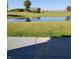 Scenic backyard view of the pond on the golf course at 11754 Hamble Dr, Indianapolis, IN 46235
