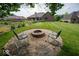 Outdoor fire pit with Adirondack chairs, perfect for relaxing evenings at 120 Wagon Trail, Mooresville, IN 46158