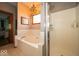 Modern bathroom with a soaking tub, separate shower, and tile flooring at 120 Wagon Trail, Mooresville, IN 46158