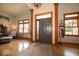 Welcoming foyer with hardwood floors and natural light at 120 Wagon Trail, Mooresville, IN 46158
