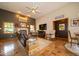 Inviting living room with a fireplace, hardwood floors, and neutral tones at 120 Wagon Trail, Mooresville, IN 46158