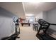 Basement with work out equipment, pool table, and neutral colored walls at 12093 Ashland Dr, Fishers, IN 46037
