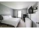 Cozy bedroom with modern amenities and wall mounted TV at 12093 Ashland Dr, Fishers, IN 46037