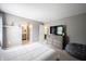 Comfortable bedroom with stylish gray tones and easy bathroom access at 12093 Ashland Dr, Fishers, IN 46037