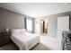 Spacious bedroom featuring plush bedding and a bright window view at 12093 Ashland Dr, Fishers, IN 46037