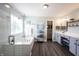Beautiful main bathroom with double vanity, separate tub and glass enclosed shower at 12093 Ashland Dr, Fishers, IN 46037
