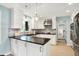 Modern kitchen featuring white cabinets, stainless steel appliances, and stylish countertops at 1219 Driftwood Dr, Carmel, IN 46033