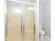 Well-maintained bathroom featuring shower with aluminum framed glass doors at 12289 Charing Cross Rd, Carmel, IN 46033