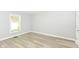 Cozy bedroom featuring large window that provides natural light at 12289 Charing Cross Rd, Carmel, IN 46033