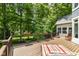 Wooden deck with outdoor seating, a lounging area, and landscaped backyard at 13017 Water Ridge Dr, McCordsville, IN 46055
