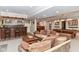 Finished basement featuring a bar area, comfortable seating, a pool table, and ample space for entertaining at 13017 Water Ridge Dr, McCordsville, IN 46055