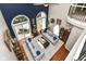 Bright living room with vaulted ceiling, comfortable seating, hardwood floors, and large windows at 13017 Water Ridge Dr, McCordsville, IN 46055