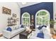 Cozy living room with vaulted ceilings, large windows, hardwood floors, and comfortable seating at 13017 Water Ridge Dr, McCordsville, IN 46055