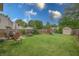 Spacious backyard with play set, storage shed, grill and plenty of green space at 1452 Brookside N Ct, Columbus, IN 47201