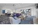 Open-concept clubhouse features dining area, kitchen, and cozy seating for community gatherings at 14877 Higgins Dr, Westfield, IN 46074