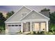 Beautiful home with a stone facade, white trim, and attached two car garage at 14877 Higgins Dr, Westfield, IN 46074
