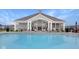 Community pool with inviting lounge area, outdoor fireplace, and comfortable seating for residents at 14877 Higgins Dr, Westfield, IN 46074