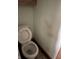 Close up of an outdated toilet in a bathroom showing its condition at 1546 Wade St, Indianapolis, IN 46203