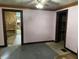 View of a bedroom, showcasing bare floors, freshly painted walls, and natural light at 1546 Wade St, Indianapolis, IN 46203