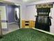 A cozy bedroom with a decorative window covering at 1546 Wade St, Indianapolis, IN 46203