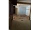 Renovation progress reveals hardwood floors and a doorway into an adjacent room at 1546 Wade St, Indianapolis, IN 46203