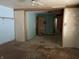 Bright and airy living room with hardwood floors and a glimpse into the other rooms at 1546 Wade St, Indianapolis, IN 46203