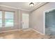 Bright foyer showcasing hardwood floors and a white front door at 16071 Prince Ct, Noblesville, IN 46062