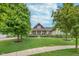 Charming home featuring a well-manicured lawn, mature trees, and inviting front porch at 16071 Prince Ct, Noblesville, IN 46062