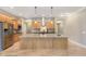 Spacious kitchen featuring a large island, stainless steel appliances, and light wood cabinets at 16071 Prince Ct, Noblesville, IN 46062