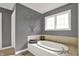 Bathroom with a soaking tub next to a window at 16316 Brookhollow Dr, Westfield, IN 46074