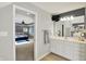 Modern bathroom with a vanity and an open doorway to a bedroom at 16316 Brookhollow Dr, Westfield, IN 46074