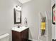 Cozy bathroom features a modern vanity, decorative ladder, and neutral color palette at 16316 Brookhollow Dr, Westfield, IN 46074