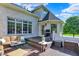 Outdoor deck with comfortable seating, a grill, and stylish decor for relaxation and entertainment at 16316 Brookhollow Dr, Westfield, IN 46074