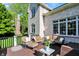 Relaxing deck area perfect for entertaining, complete with comfortable seating and outdoor decor at 16316 Brookhollow Dr, Westfield, IN 46074