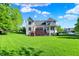 Backyard view of the home highlighting the expansive yard and outdoor living space at 16316 Brookhollow Dr, Westfield, IN 46074