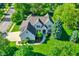 Stunning two-story home with a lush green yard and impeccable landscaping at 16316 Brookhollow Dr, Westfield, IN 46074