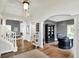 Welcoming foyer with hardwood floors, open view to other living areas, and elegant decor at 16316 Brookhollow Dr, Westfield, IN 46074