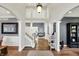 Spacious foyer with hardwood floors, grand staircase, and an open layout leading to the living areas at 16316 Brookhollow Dr, Westfield, IN 46074