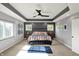 Spacious main bedroom with tray ceilings, neutral carpet, and plenty of natural light at 16316 Brookhollow Dr, Westfield, IN 46074
