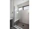 Modern bathroom with a glass-enclosed shower and built-in bench at 17339 Newton Main St, Westfield, IN 46074