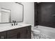 Modern bathroom showcasing a vanity and shower-tub combination at 17339 Newton Main St, Westfield, IN 46074