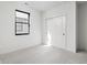 Bright bedroom featuring neutral carpet, natural light, and closet with sliding doors at 17339 Newton Main St, Westfield, IN 46074