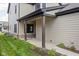 View of home's exterior showcasing a covered patio with dark wood support beams at 17339 Newton Main St, Westfield, IN 46074