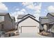 Two-story home with a light-colored garage and black trim at 17339 Newton Main St, Westfield, IN 46074