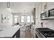 Beautiful living space with a view of the kitchen, fireplace, and front door at 17339 Newton Main St, Westfield, IN 46074