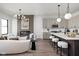 Open concept living space featuring a kitchen and fireplace at 17339 Newton Main St, Westfield, IN 46074