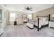 Cozy primary bedroom features carpet floors, a ceiling fan, and natural light at 18763 Abigail Cir, Westfield, IN 46062